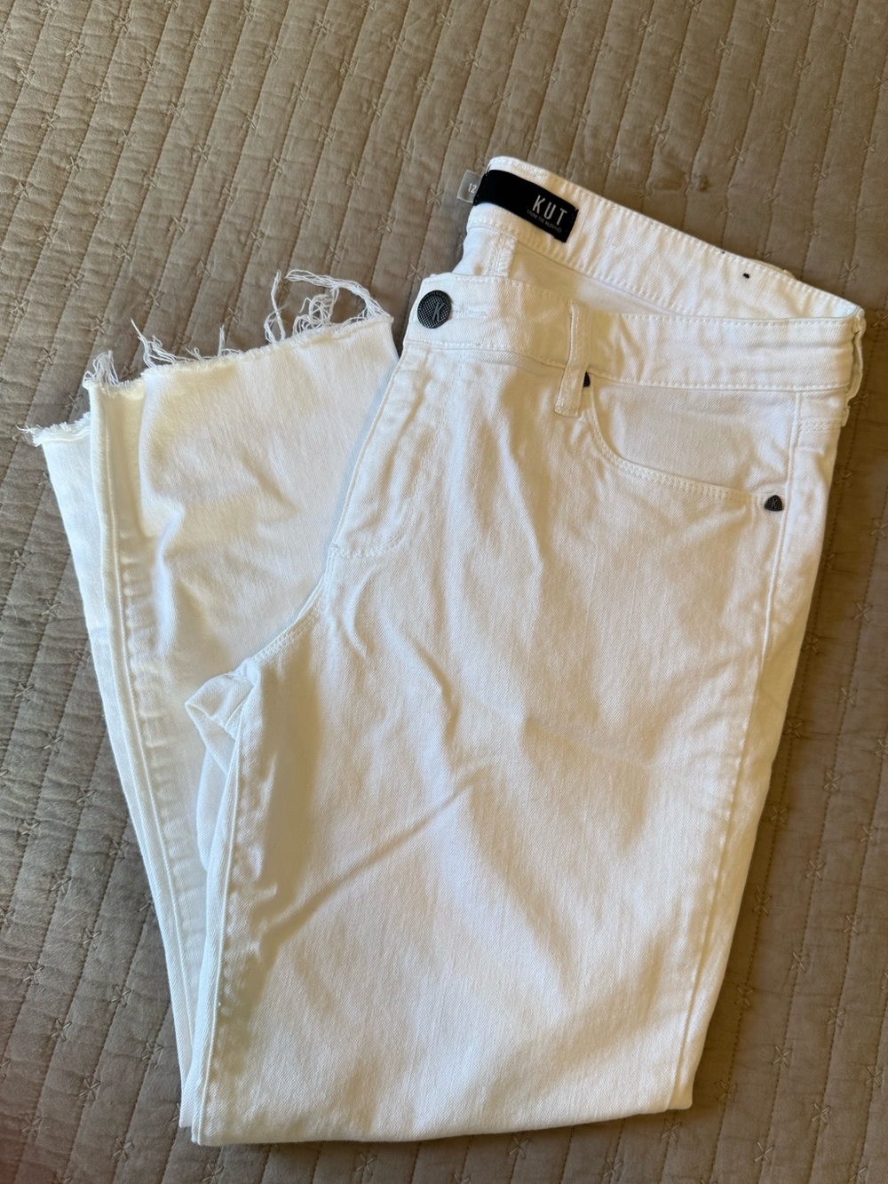Kit from the Kloth Reese ankle length raw hem jeans